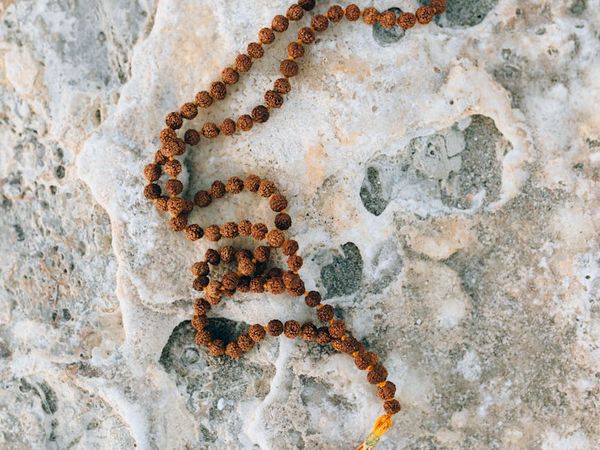 Silhouette of a person at sunrise feeling energized and free.
